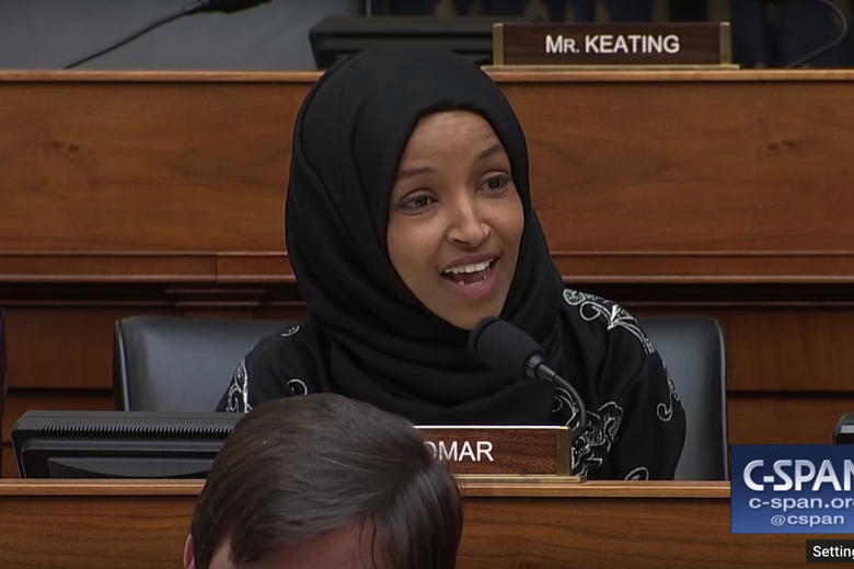 A screenshot from the video of the exchange. Omar is speaking from her seat on the committee.
